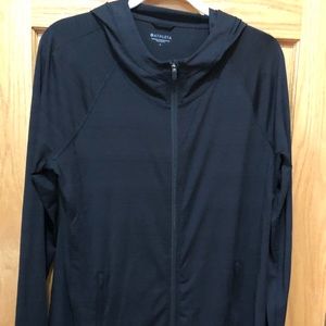 Womens Athleta black hooded zip front sweatshirt with thumbhole sleeves.